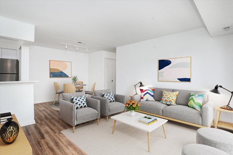 a living room with couches and a coffee table